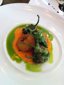 Hush puppies and padron peppers with romesco