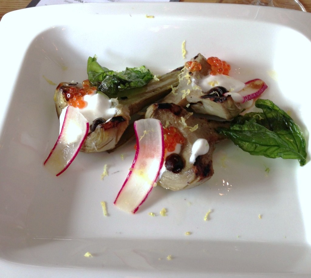 Grilled artichokes with yogurt, trout roe, black garlic and basil