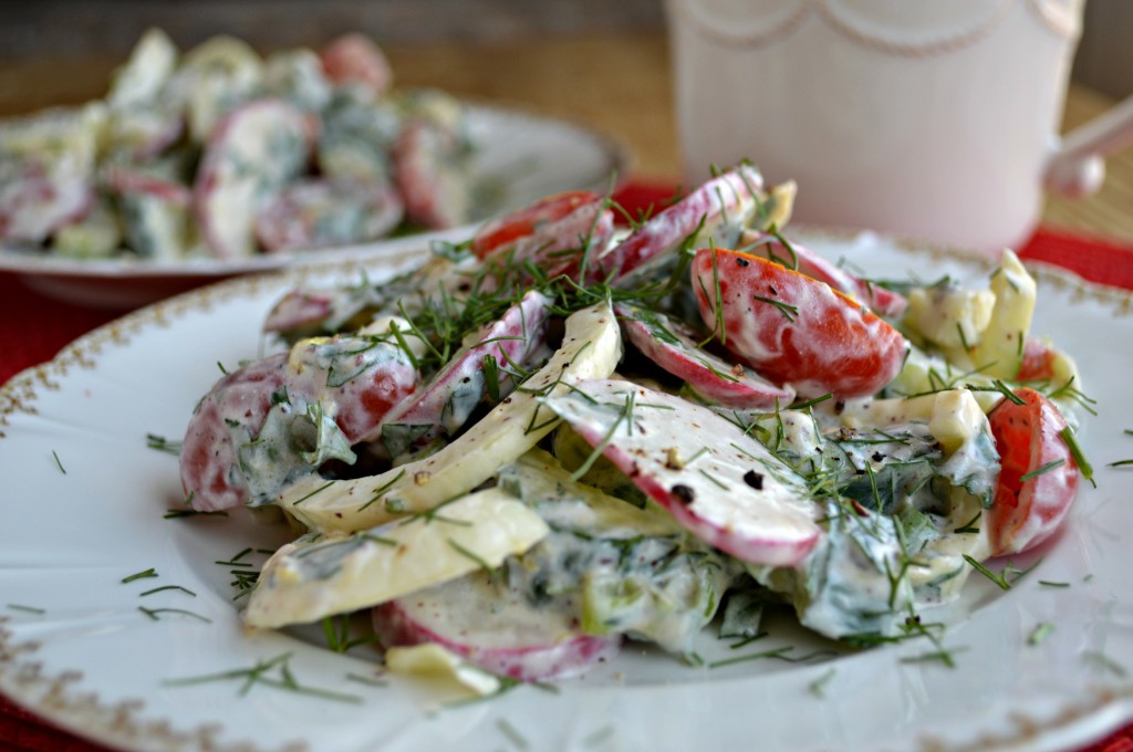 tangy yogurt dressing coats a chopped vegetable salad