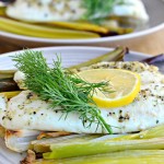 Tilapia with Lemon, Pepper and Herbs over Roasted Leeks