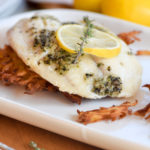 Tilapia with Lemon, Pepper & Herbs on Crispy Potato Pancakes