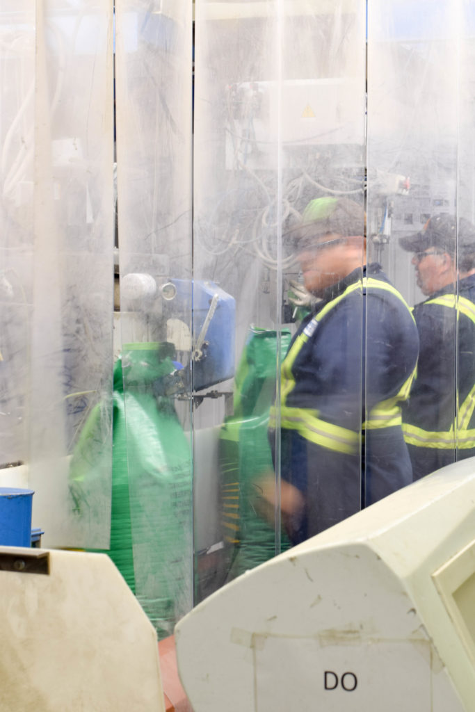 Simpson Seeds employees bagging lentils bound for Iran.